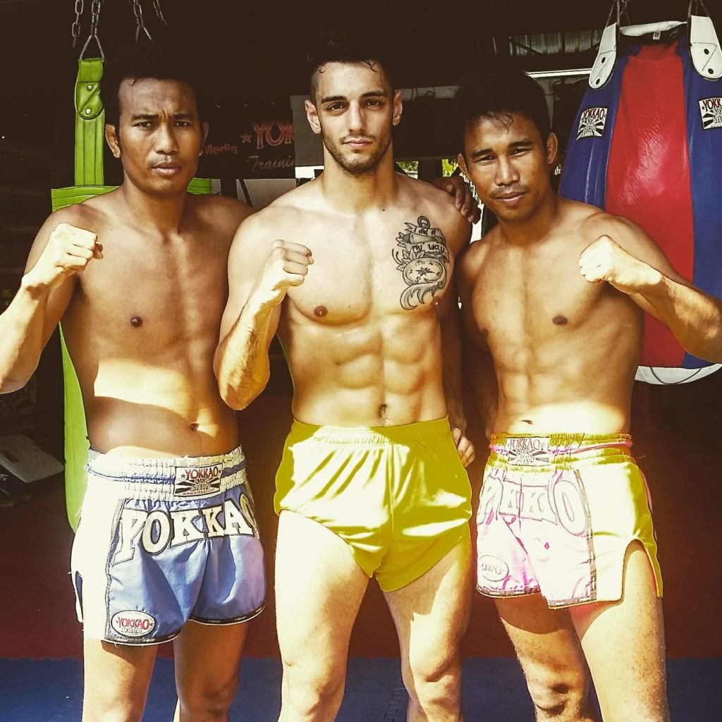 Erhan Güngör with two Thai training partners at the YOKKAO Training Center